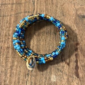 Blue and Gold Beaded Bracelet with Shell Charm
